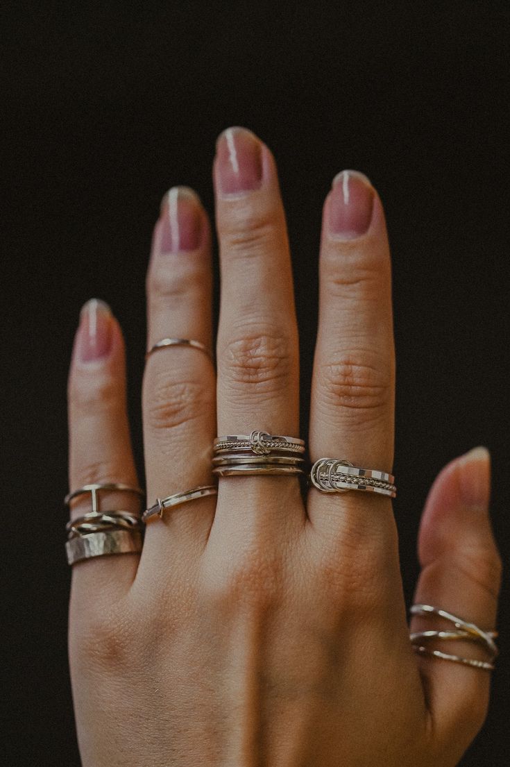 This is a gorgeous, unique ring set made up of three individual rings that are permanently linked together. All of the rings move independently of each other and are so fun to fidget with! The three links holding the pieces together are so satisfying to play with, too - you'll want to spin, flip and roll this ring all day long! The entire Link Ring collection makes perfect stacking rings when worn with other pieces. Did we mention the gorgeous texture combination? The extra thick ring paired wit Metal Jewelry With Ring Detail And Modern Twist, Modern Metal Jewelry With Ring Detail, Everyday Silver Stacked Rings, Everyday Stacked Silver Rings, Sterling Silver Stacked Promise Rings, Modern Twist Sterling Silver Jewelry With Ring Detail, Sterling Silver Jewelry With Modern Twist, Sterling Silver Jewelry With Ring Detail, Modern Twist, Stackable Sterling Silver Fusion Rings