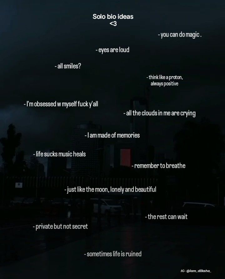 a poem written in the dark with an image of a city at night behind it