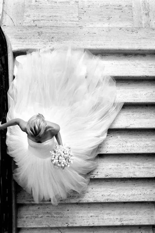 black and white photograph of a woman in a tutu