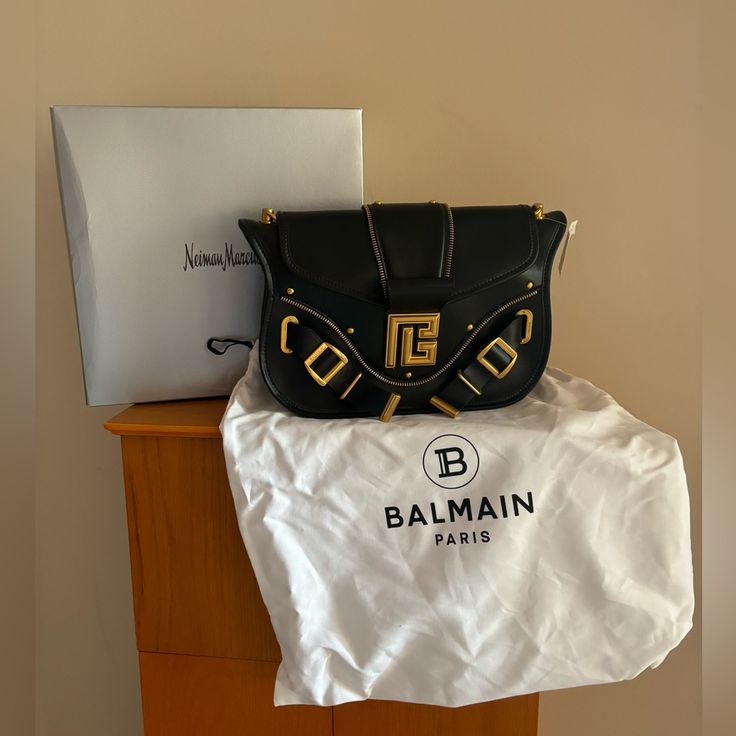 Brand New Authentic Balmain Black Leather Blaze Shoulder Bag. Comes With Detachable Shoulder Strap Dust Bag And Nm Box Party Shoulder Bag With Logo Hardware, Designer Travel Flap Bag With Branded Hardware, Designer Evening Bag With Metal Logo, Evening Flap Shoulder Bag With Logo Hardware, Designer Evening Bags With Metal Logo, Designer Bags With Logo Hardware For Party, Designer Crossbody Flap Bag With Branded Hardware, Black Flap Bag With Branded Hardware For Shopping, Designer Black Flap Bag For Shopping