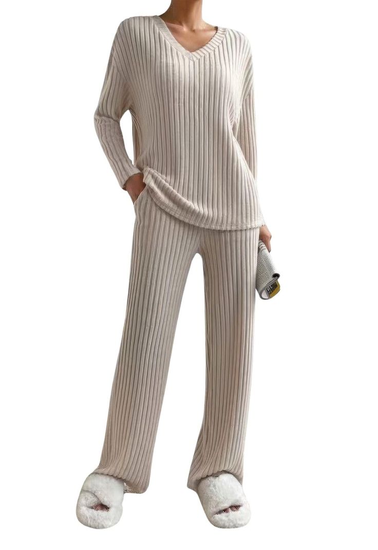 PRICES MAY VARY. Fall Lounge Sets, including one pullover sweater and straight leg pants, ribbed knit fabric. They are made of premium polyester, soft and skin-friendly, warm, lightweight, no pilling and smell, cozy to wear. Feature: 2 Piece fall winter lounge outfits, knitted sweater lounge sets, solid v-neck long sleeve pullover top and wide leg long trousers, casual loose matching outfits, soft cozy sleepwear, pajamas set. The clean and streamlined cut perfectly creates your fashion style. Ri Ribbed Loungewear, Lounge Wear Sets, Womens Pjs, Clothes Pants, Winter Pajamas, Gray Pants, Suit Fabric, Loungewear Sets, Loungewear Set