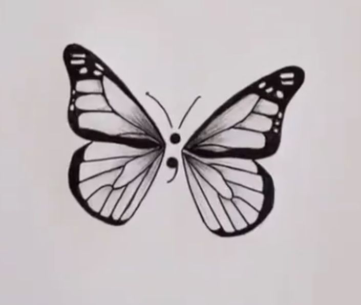 a black and white drawing of a butterfly