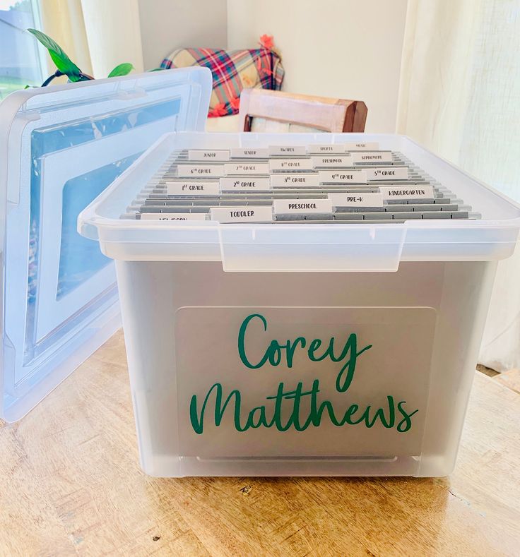 a plastic storage box with the words corey matters written on it in green ink