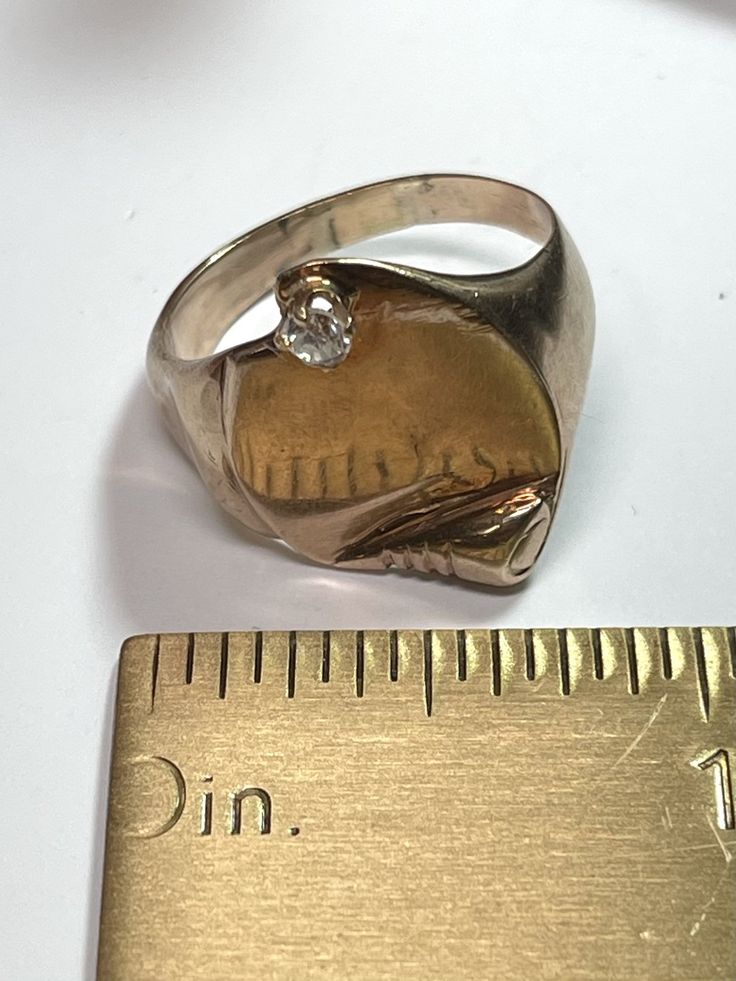 . Vintage Signet ring that would be great on a man or a woman. Circa 1960 14 yellow gold with a 0.10 carat round brilliant cut diamond I-SI1. Size 10.25. Very comfortable. 8.00 grams 14k yellow gold and diamond Size 10.25 Diamond Yellow Gold Hallmarked Signet Ring, Yellow Gold Diamond Signet Ring Hallmarked, Antique 14k Stamped Diamond Signet Ring, Antique Signet Ring With Single Diamond, Antique Yellow Gold Signet Ring With Brilliant Cut, Vintage Signet Ring With Single Diamond, Vintage Yellow Gold Signet Ring With Single Diamond, Antique Yellow Gold Brilliant Cut Signet Ring, White Gold Diamond Signet Ring Stamped 14k