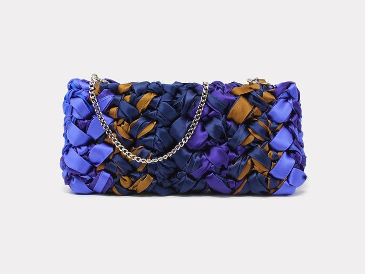 Ribon clutch multicolor luxury double satin luxe Composition: Double satin luxe 100% poly Measurement: 10 x 5.5 inches Closure inside internal frame Silk lining Handmade in Italy Handsigned signature label Each bag is entirely crocheted by extremely skilled artisans in Florence, Italy, and one of a kind. Being a artisanal product, the size could be slightly different. It can take hours and days to crochet your bag. Please take good care of it. We hope you enjoy! Micro Bag, Round Bag, Bamboo Handles, Floral Applique, Florence Italy, Flap Bag, You Bag, Florence, Satchel