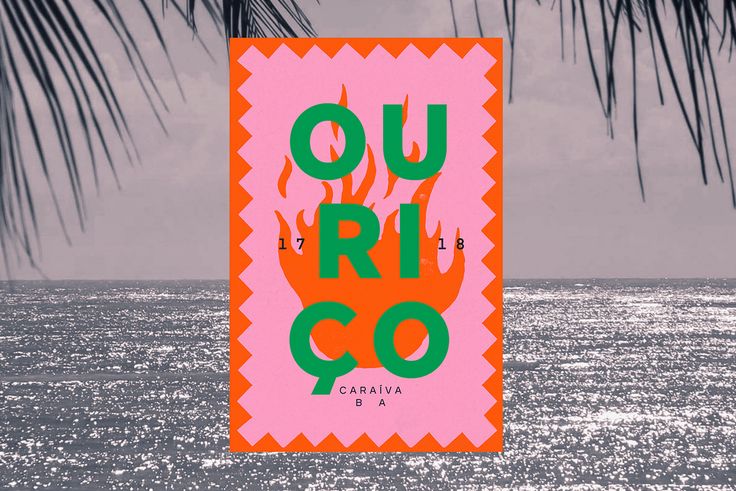 there is a sign that says ou rio go in front of the ocean and palm trees