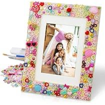 a multicolored photo frame sitting on top of a table