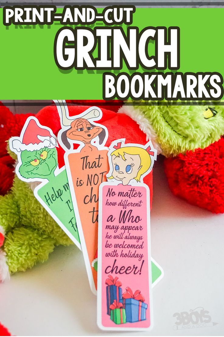 the grinch bookmarks are on display next to stuffed animals