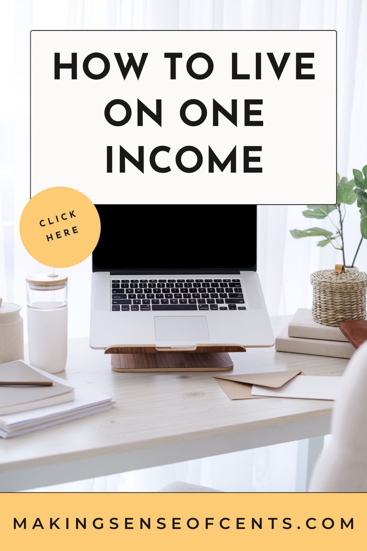 a laptop on a desk with the words how to live on one income above it