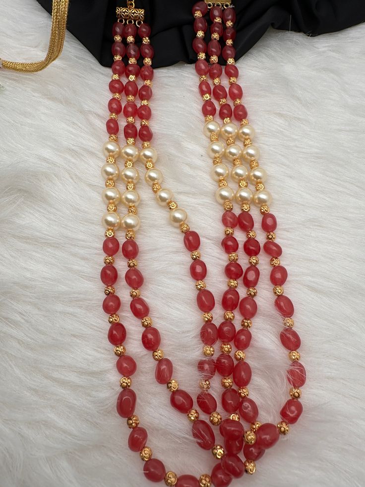 Ruby Pearls Nakshi Multi Layer Necklace Only Neckalce no earringsColor : GoldenSize : Necklace Length : 22 Inches Approx;Stones : Pearl Real Emeralds Nakshi Balls Temple Jewelry Necklaces With Stones For Jewelry Making, Red Temple Necklace With Stone Work For Gift, Red Stone Work Temple Necklace For Gift, Gift Red Temple Necklace With Stone Work, Red Round Beads Jewelry For Puja, Red Round Necklace For Puja, Spiritual Stone Necklace For Festive Occasions, Festive Spiritual Stone Necklace, Multicolor Necklaces With Stone Work And Round Beads