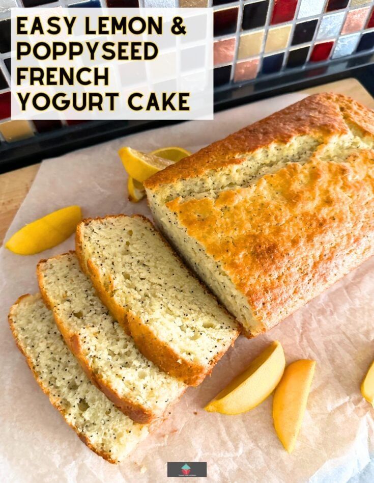 sliced loaf of easy lemon poppy seed french yogurt cake on a cutting board