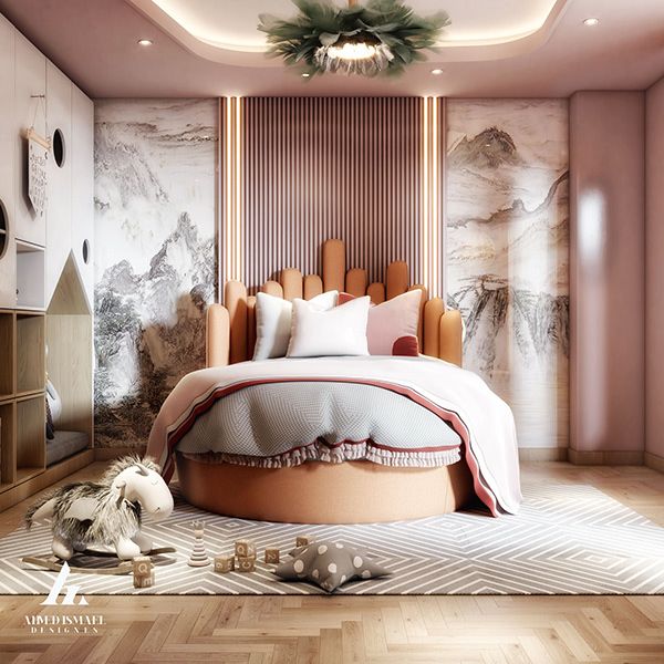 a large bed sitting on top of a wooden floor next to a white and pink wall