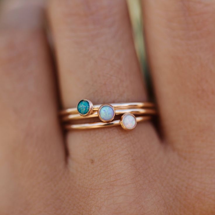 Dainty band with 3 different opal stone options. Looking for something a little bigger? Shop the 5mm stone here. Minimalist Opal Birthstone Jewelry, Dainty Opal Ring Gift, Dainty Opal Ring With Birthstone In Round Band, Dainty Adjustable Opal Gemstone Ring, Dainty Adjustable Opal Ring Gift, Minimalist Adjustable Opal Ring, Adjustable Opal Birthstone Ring For Everyday, Adjustable Rose Gold Opal Jewelry, Adjustable Opal Ring With Round Stone