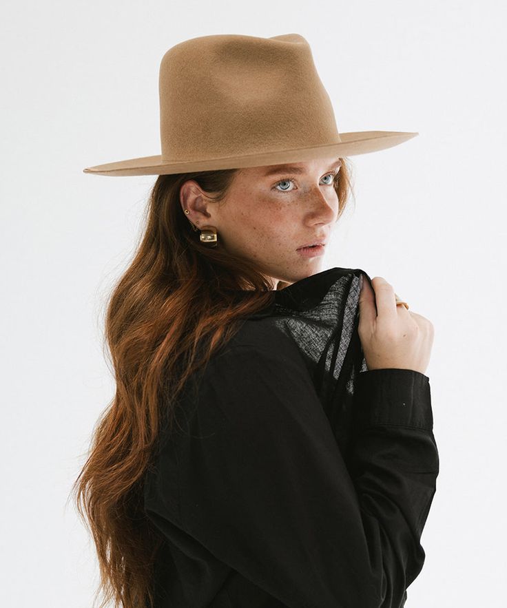 Ava’s smooth, pinched crown set this style apart. Combined with a medium upturned brim, the Ava is both approachable + versatile, constructed of temperature regulating wool felt to keep you cool. Featuring a subtle but elevated embossed leather tab on the brim, the crown is a canvas for you to customize. Add your own touch by including a hat band which you can find here. Bands sold separately. Classic Spring Fur Felt Fedora, Classic Brimmed Felt Hat For Everyday, Classic Wide Brim Felt Hat For Everyday, Winter Fedora Fitted For Everyday Wear, Fitted Winter Fedora For Everyday Wear, Elegant Solid Fedora For Everyday Wear, Classic Wool Felt Hat For Winter, Classic Felt Hat For Everyday Fall Wear, Classic Felt Hat For Fall