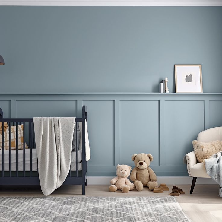 a baby's room with blue walls and teddy bears on the floor in front of it