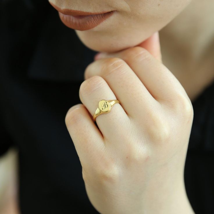 💍 💍 💍 💍 💍 This beautiful ring is handmade using pure 925 sterling silver and with your personalized initial, word, or characters. A stylish, unique accessory that makes a great gift to show somebody (or yourself, because you matter ♥) that you're thinking of them. Perfect for graduations, wedding events, holidays, Mothers' day, and birthdays. Colors: Silver Gold Rose Gold Other styles are available in our shop at https://www.etsy.com/shop/SilverbySelene. Please contact us if you have any questions or requests/ideas for our shop, we'd love to hear from you! Dainty Yellow Gold Signet Ring For Gift, Sterling Silver Oval Midi Rings For Gift, Oval Sterling Silver Midi Rings For Gift, Fine Jewelry Sterling Silver Signet Ring Gift, Handmade Sterling Silver Birthstone Ring Gift, Classic Open Birthstone Ring As Gift, Personalized Minimalist Engraved Ring As A Gift, Dainty Adjustable Signet Ring For Anniversary, Sterling Silver Signet Ring As Gift