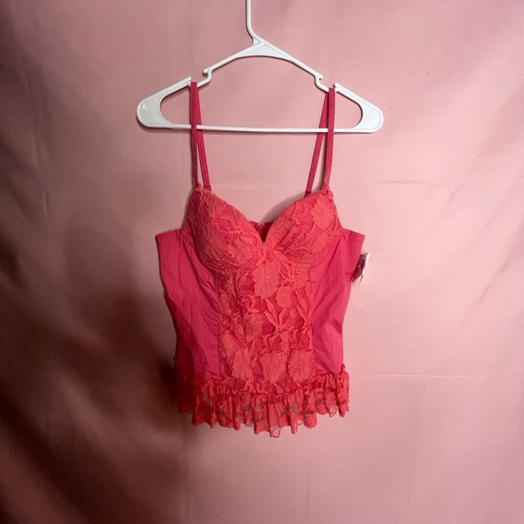 Nwt Deadstock Pink And Orange / Coral Lace Ruffled Cami Top Or Bustier 10/10 Condition Brand: Faisca Size: M Best For B Cup Message For Measurements! (Ignore) Rack I Accept Offers! Free Kawaii Sticker With Every Order Check Profile For Bundle Info! 1 Day Handling Time I Try My Best To Make Sure Everything Is In Great Shape, However I Am Human And Can Miss Flaws. Most Things Are Used & Thrifted , That’s The Risk Of Buying Secondhand #Y2k #Vintage #Fairy #Cottagecore #Coquette Pink Underwire Corset With Built-in Bra, Pink Sleeveless Summer Corset, Pink Sleeveless Corset For Summer, Fitted Bra With Straps, Pink Camisole With Delicate Straps, Pink Coquette Camisole For Summer, Spring Pink Spaghetti Strap Corset, Pink Spaghetti Strap Corset For Spring, Pink Strapless Corset For Spring