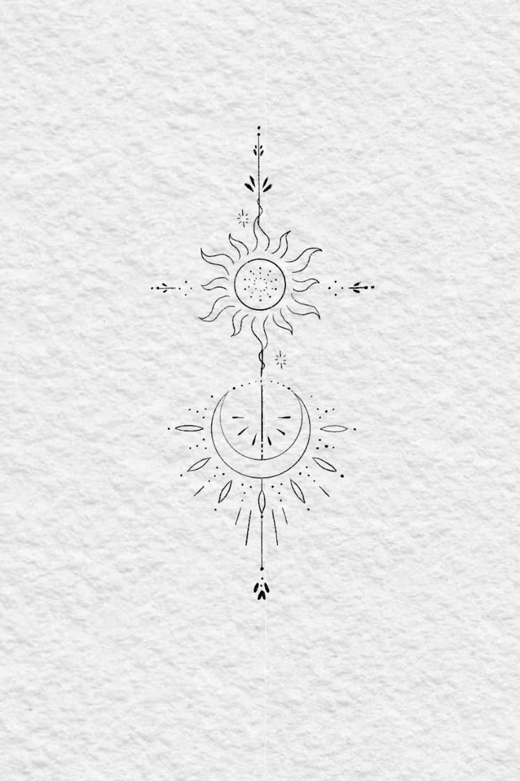 the sun and moon are drawn in black ink on white paper, with an arrow pointing up