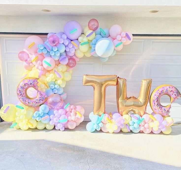 balloons are arranged in the shape of letters spelling out