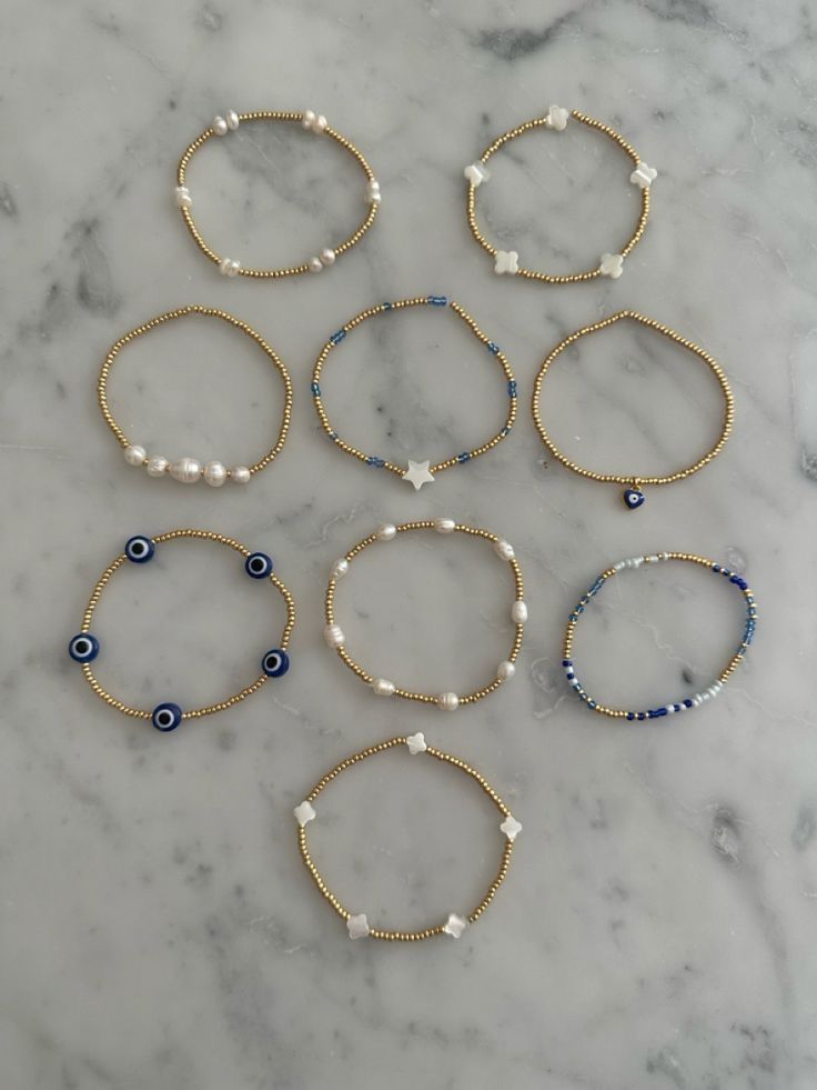 Bracelet Inspo Preppy, Blue And Gold Beaded Bracelets, Preppy Gold Bracelet Stack, Where To Buy Bracelets, Perment Jewelry, Bracelet Ideas Aesthetic Beaded, Gold And Blue Bracelet, Beaded Stack Bracelets, Cute Trendy Bracelets