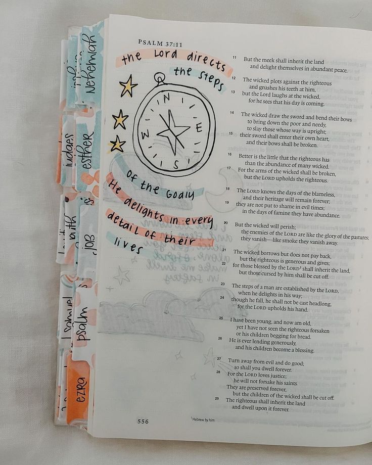 an open book with writing on it and a clock drawn on the page in red