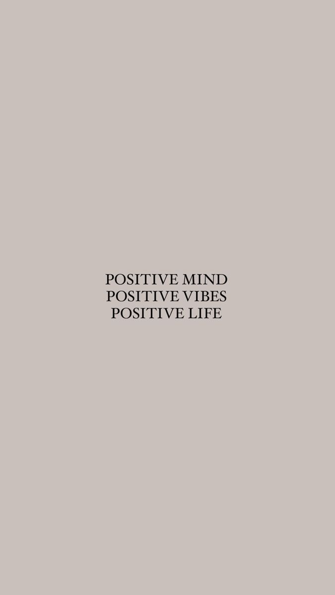 the words positive mind and negative life written in black on a gray background