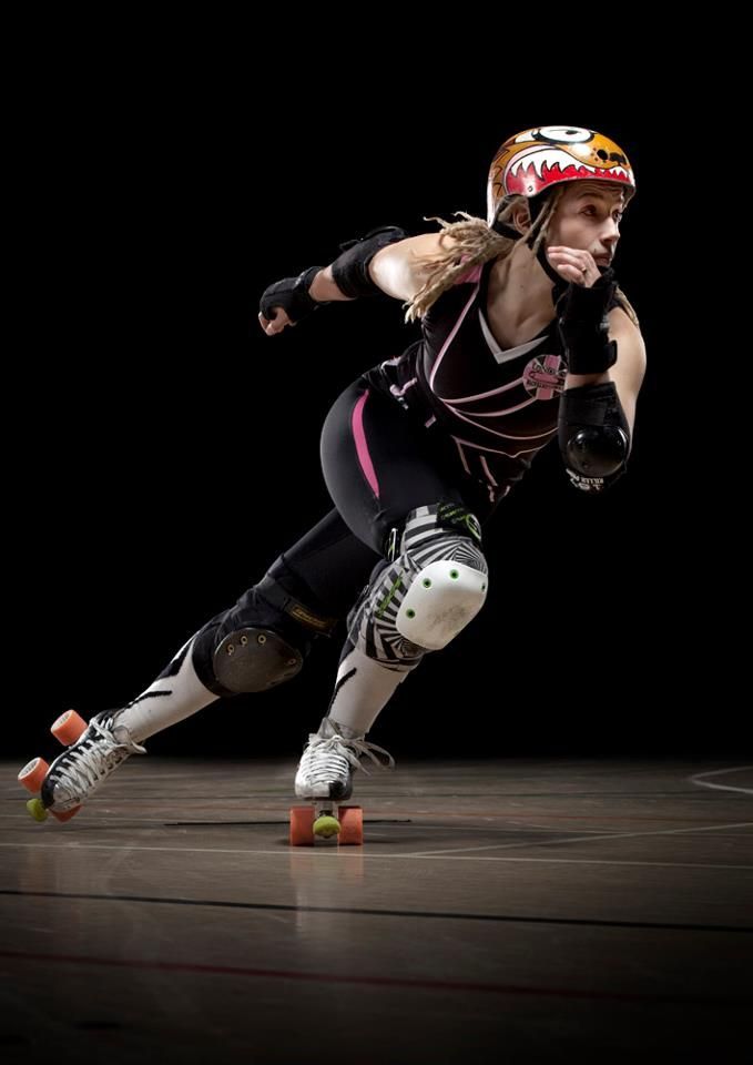 a female rollerblader in action on the court