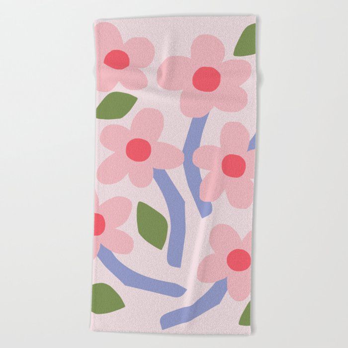 a pink towel with flowers on it