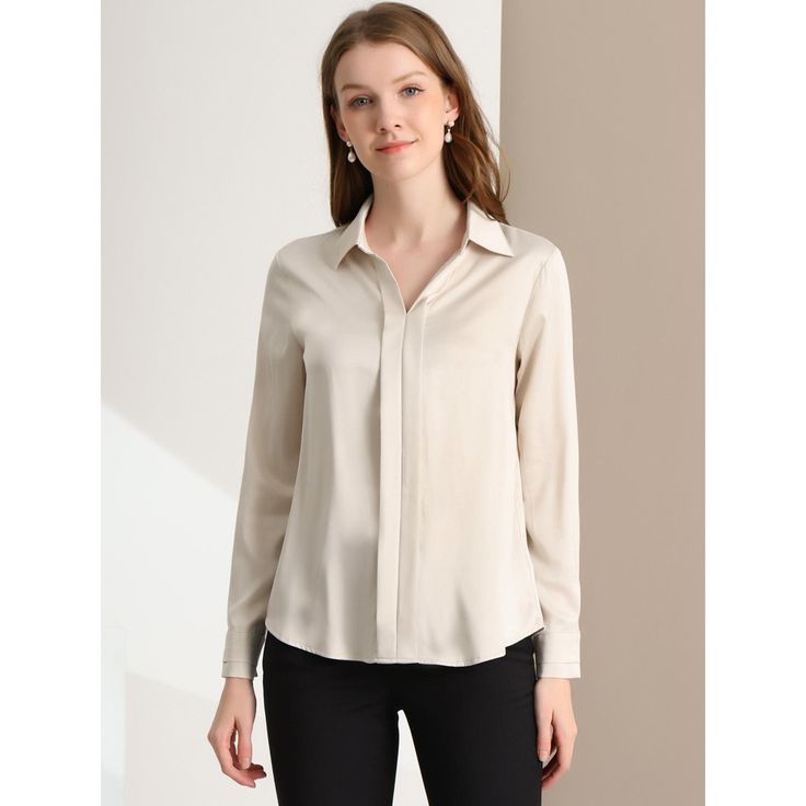 The smooth, soft, and minimalist design updates this collared no-buttons shirt for understated charm. This seriously chic long-sleeve shirt is the perfect way to elegantly elevate any outfit. This simple shirt is an elegant take on a wardrobe classic, featuring a stylish v-neckline. The charm of women is shown perfectly at this moment. In a red smooth fabric, this can be styled up or down whatever the occasion. Just tuck the front into black or white pants for an office day. Chic Solid Blouse With Collared Neckline, Chic Solid Color Blouse With Collared Neckline, Elegant Collared Tops In Solid Color, Elegant Office Wear Blouse With Placket, Solid Color Long Sleeve Formal Shirt, Sleek Spread Collar Blouse For Work, Formal Long Sleeve Solid Color Shirt, Sleek Blouse With Spread Collar For Work, Elegant Business Blouse With Placket