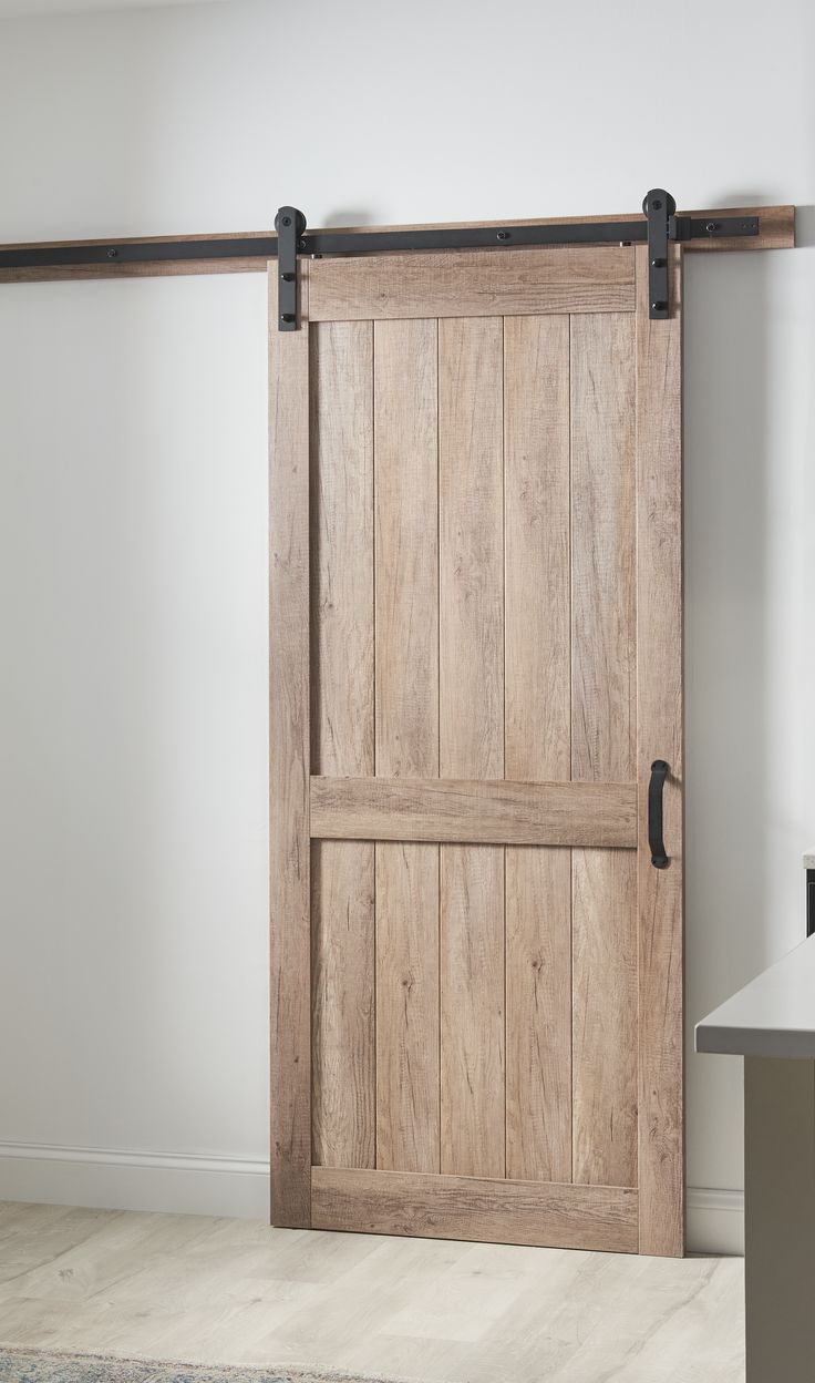 2 panel barn door kit from Masonite Barn Door Diy, Barn Door Bathroom, Bedroom Barn Door, Barnyard Door, Barn Doors Interior, Barn Door Pantry, Bathroom Barn Door, Farm Door, Wooden Barn Doors