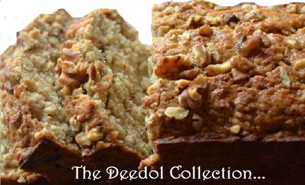 a loaf of bread with walnuts on top and the words the peddi collection