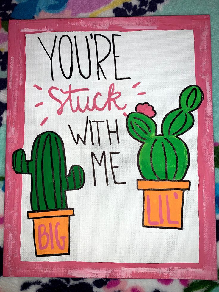 a pink and white sign with two cactuses on it that says you're stuck with me