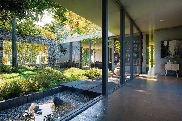 the interior of a modern house with glass walls and trees in the back ground area