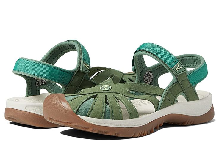 KEEN Rose Sandal - Women's Shoes : Dark Ivy/Butterfly : Traverse rocky terrain and rushing rivers with the adventure-ready Rose Sandal by Keen. Washable polyester webbing upper material. Adjustable hook-and-loop closure provides a secure and comfortable fit. Aegis Microbe Shield treated lining. Metatomical EVA molded footbed with Aegis protection. Multi-directional lug pattern for increased traction. Non-marking rubber outsole provides great durability. Women's specific fit. Imported. Measuremen Green Sandals With Removable Insole For Outdoor, Comfortable Green Sport Sandals For Outdoor, Green Sandals With Cushioned Footbed For Outdoor, Green Sandals With Cushioned Footbed For Outdoor Activities, Green Open Toe Sport Sandals With Arch Support, Green Sport Sandals For Outdoor Spring Activities, Green Outdoor Sport Sandals For Spring, Adjustable Green Sport Sandals With Removable Insole, Green Cushioned Sandals For Outdoor Activities