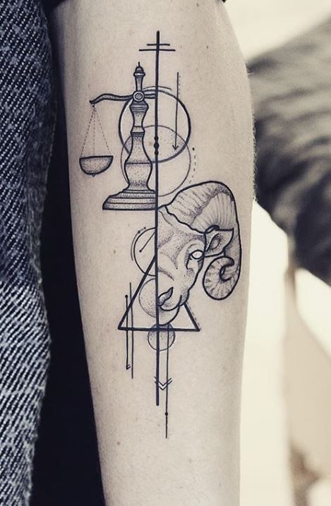 a tattoo on the arm of a person with an animal, hour and hour scale