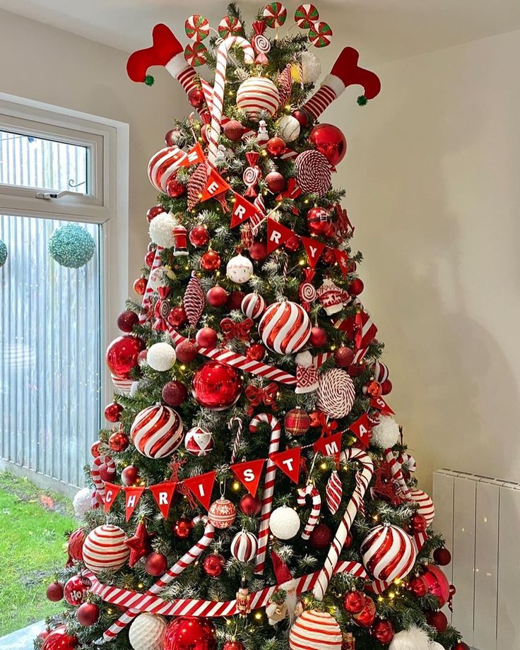 a christmas tree decorated with candy canes and ornaments