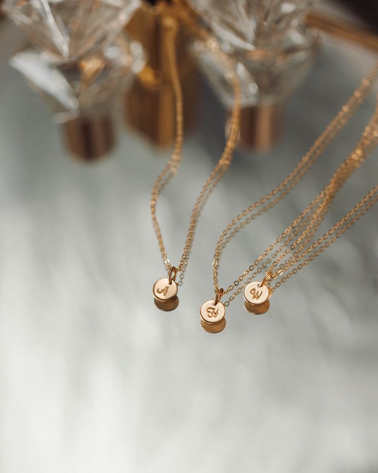 The no-stress way to dress your entire bridal party—curated by us, discounted for you! This bridesmaid jewelry set includes your choice of up to seven Personalized Yue Necklaces crafted in one chosen metal, each with their own initial. These are pieces they’ll love on your wedding day and wear all the days after—meaningful gifts and timeless looks all in one. Each necklace arrives packaged separately in our sleek new gift-ready boxes, with letterpress cards to fill out at home. To order, select Elegant 14k Gold-filled Initial Pendant Charm Necklaces, Elegant 14k Gold-filled Charm Necklaces With Initial Pendant, Elegant 14k Gold Filled Initial Necklace, Elegant 14k Gold Necklaces With Initials, Elegant Gold Initial Necklace 14k Gold Filled, Elegant 14k Gold-filled Initial Necklace, Minimalist Formal Charm Necklace With Initial Pendant, Elegant 14k Gold Name Necklace With Round Pendant, Minimalist Initial Pendant Charm Necklace For Formal Events