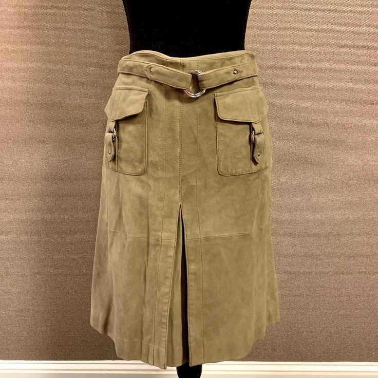 Etcetera Suede Skirt With Buckle Details. Lined. Front Pleat. Side Zip. Hits At Knee On 5’ 7” Female. Never Worn Elegant Fitted Cargo Skirt For Spring, Fitted Knee-length Cargo Skirt With Lining, Belted Knee-length Beige Skirt, Skirt With Buckle, Suede Skirt, Side Zip, Womens Skirt, A Line, Buckle