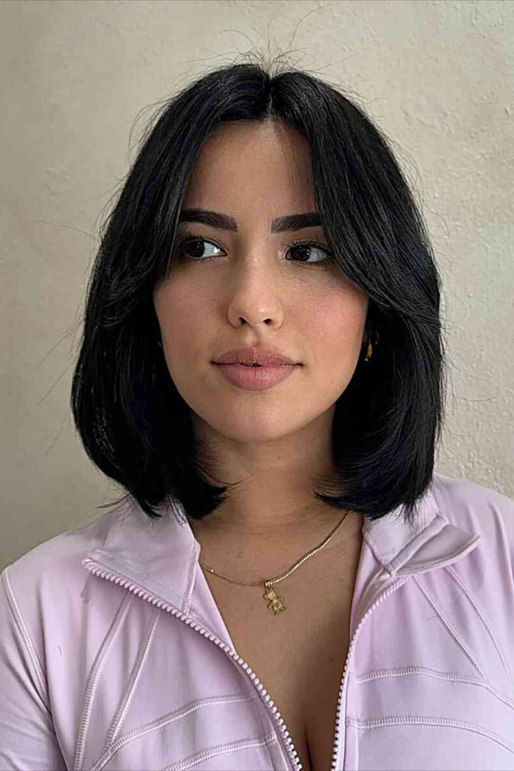 Sophisticated woman with a longer bob and middle-parted bangs Lived In Bob Haircuts, 90s Lob Fine Hair, Bob Haircuts For Women With Thick Hair, Haircuts In Style, Short Bob With Front Layers, Middle Bob Hairstyles, Black Bob With Curtain Bangs, Short Hairstyle Middle Part, Straight Long Bob Hairstyles