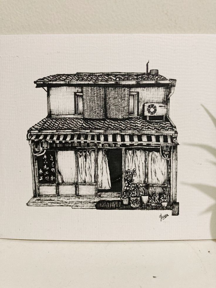 a black and white drawing of a building