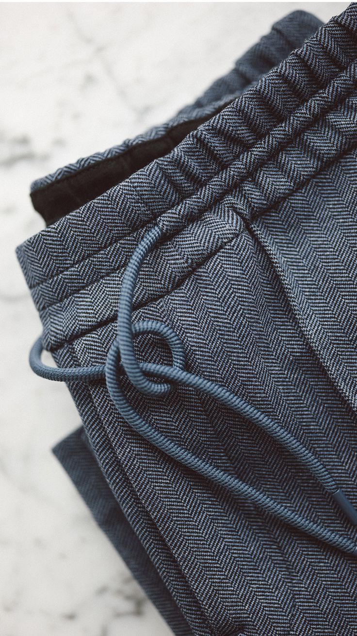 a close up view of the back end of a pair of pants with a cord attached to it