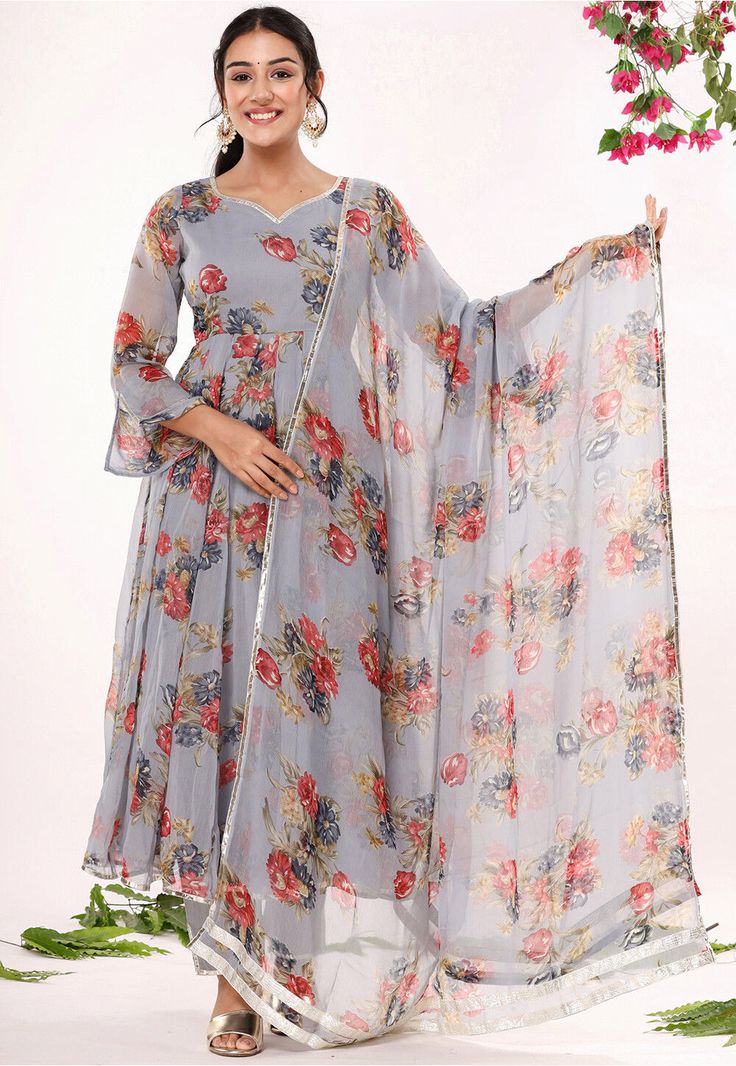 Faux Chiffon A Line Kameez in Grey This Readymade attire is Enhanced with Digital, Floral Print and Gota Lace Work. Crafted in Sweetheart Neck and Quarter Sleeve Available with a Cotton Pant and a Faux Chiffon Dupatta in Grey The Kameez and Bottom Lengths are 50 and 39 inches respectively Do note: Accessories shown in the image are for presentation purposes only and length may vary upto 2 inches.(Slight variation in actual color vs. image is possible). Multicolor Georgette Palazzo Set With Digital Print, Multicolor Palazzo Set In Georgette With Digital Print, Multicolor Digital Print Georgette Palazzo Set, Long Sleeve Georgette Palazzo Set With Sheer Dupatta, Georgette Palazzo Set With Sheer Dupatta And Long Sleeves, Floral Print Georgette Anarkali Set For Party, Georgette Long Sleeve Palazzo Set For Spring, Floral Georgette Anarkali Set For Party, Party Wear Floral Anarkali Set In Georgette