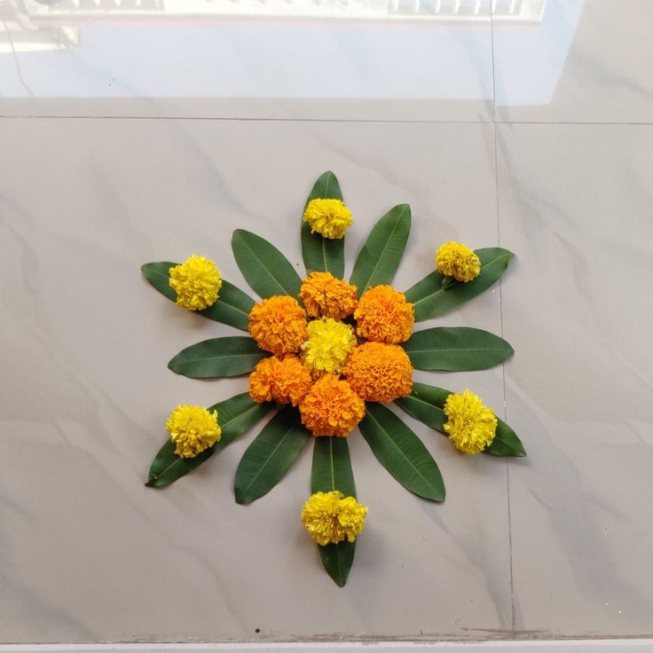 an arrangement of flowers arranged in the shape of a flower