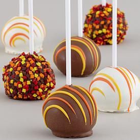 there are many different types of cake pops on this photo and it looks like they were made from candy