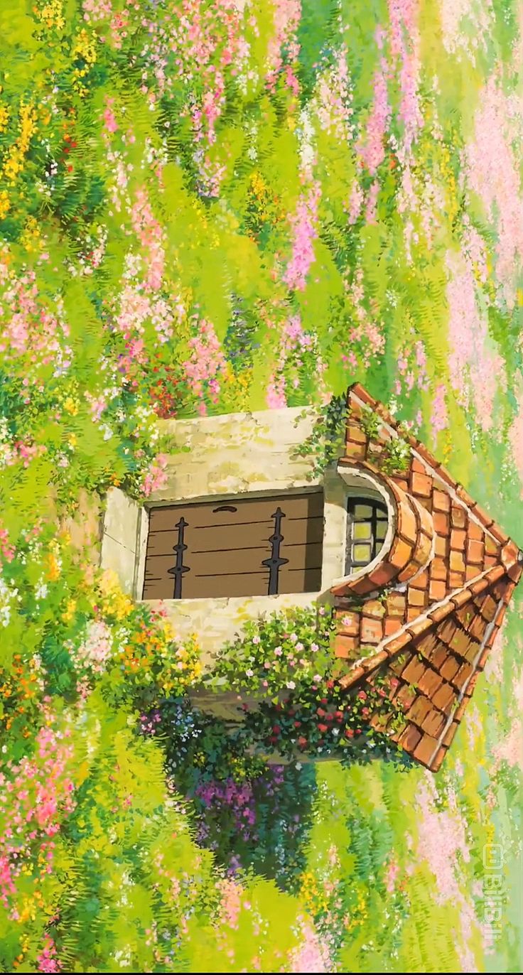 an aerial view of a house in the middle of flowers