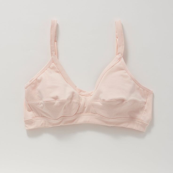 A more supportive style for larger cup sizes. Horizontal seams across the cups, fabric front straps and other thoughtful details shape and support—without sacrificing style or comfort. Designed with measurements from real women, not mannequins. Supports A-D cups. Slip-on style, no back closure. Adjustable straps with rose gold hardware. Double-layered, organic cotton with a covered elastic band. 94% organic cotton, 6% spandex. Cut and sewn in the U.S. Machine wash and dry. Size Guide Fitted Full Coverage Sports Bra With Built-in Cups, Everyday Fitted Bra With Padded Cups, Pink Full Cup Nursing Bra With Padded Cups, Full Cup Pink Nursing Bra With Padded Cups, Everyday Underwire Bra With Built-in Support, Everyday Full Coverage Padded Nursing Bra, Everyday Underwire Bra With Built-in Bra, Fitted Nursing Bra With Padded Cups For Everyday, Everyday Bra With Padded Cups