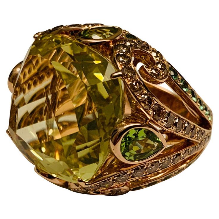 Luxury Multi-stone Yellow Gemstones, Luxury Yellow Multi-stone Gemstones, Luxury Yellow Gold Peridot Jewelry, Luxury Yellow Multi-stone Jewelry, Luxury Tsavorite Jewelry With Gemstone Accents, Luxury Citrine Gemstones With Accents, Luxury Tsavorite Ring With Gemstone Accents, Exquisite Green Jewelry With Pave Setting, Luxury Peridot Jewelry For Formal Occasions