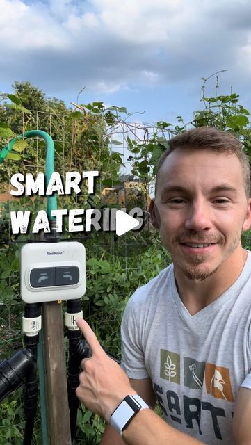 a man standing in front of a camera with the words smart watering on it