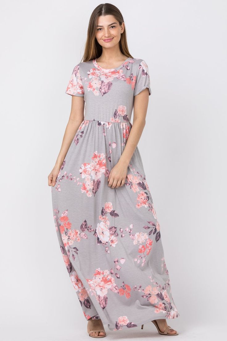 Made in the USA 78% Polyester 18% Rayon 4% Spandex Pockets, Elastic waistband, Flattering feminine fit Size: S(2-4), M(6-8), L(10-12), XL(14-16) Measurements: S: Bust 30" Waist 26" Length 56"M: Bust 32" Waist 28" Length 56.5"L: Bust 34" Waist 30" Length 57"XL: Bust 36" Waist 32" Length 57.5" Casual Pink Maxi Dress With Elastic Waistband, Casual Spring Maxi Dress With Elastic Waistband, Gray Fitted Short Sleeve Maxi Dress, Casual Gray Stretch Maxi Dress, Floral Print Stretch Maxi Dress With Short Sleeves, Stretch Floral Print Maxi Dress With Short Sleeves, Gray Stretch Maxi Dress For Spring, Spring Stretch Gray Maxi Dress, Casual Spring Dresses With Banded Waist