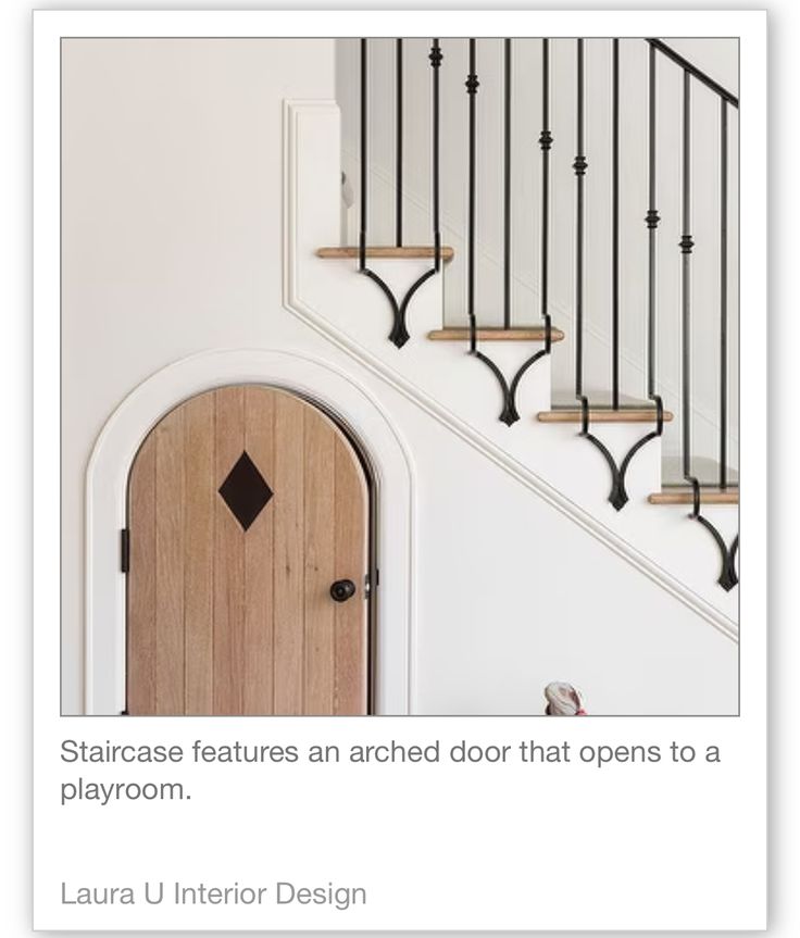 an open door and some stairs in a house with text overlay that reads, staircase features an arch door that opens to a playroom